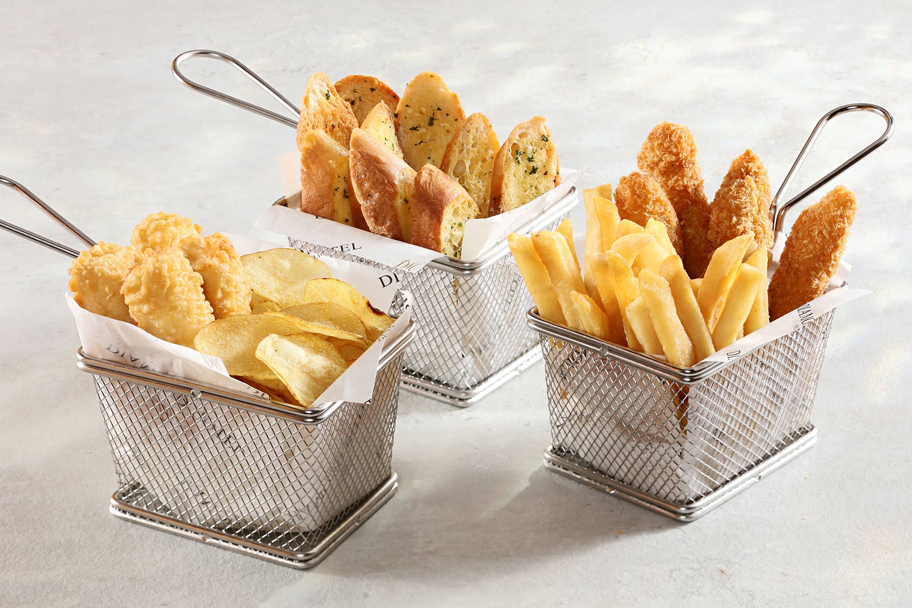 Fried snacks in baskets. Food photography and food styling for Diamond hotel, shot on location in Manila.